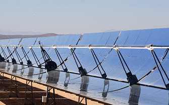 SEGS solar thermal energy electricity plant with parabolic mirrors concentrating the sunlight