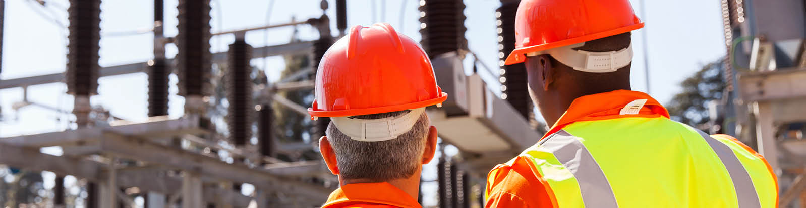 back view of two electrical engineers in substation; Shutterstock ID 210380332; PO: redownload; Job: redownload; Client: redownload; Other: redownload